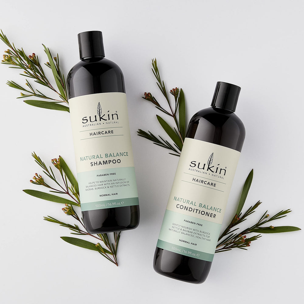 Sukin Natural Balance Shampoo label close-up highlighting natural ingredients.