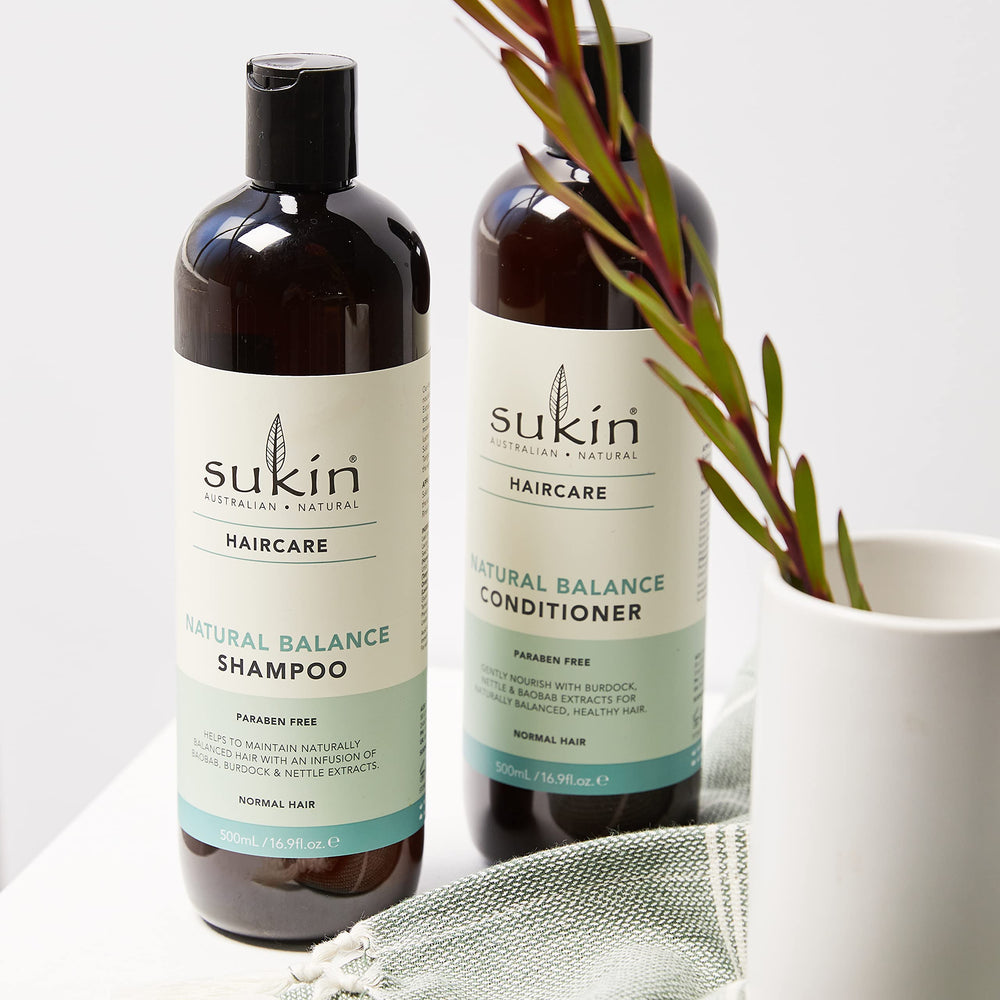 Sukin Natural Balance Shampoo foaming lather demonstrates rich cleansing for daily use.