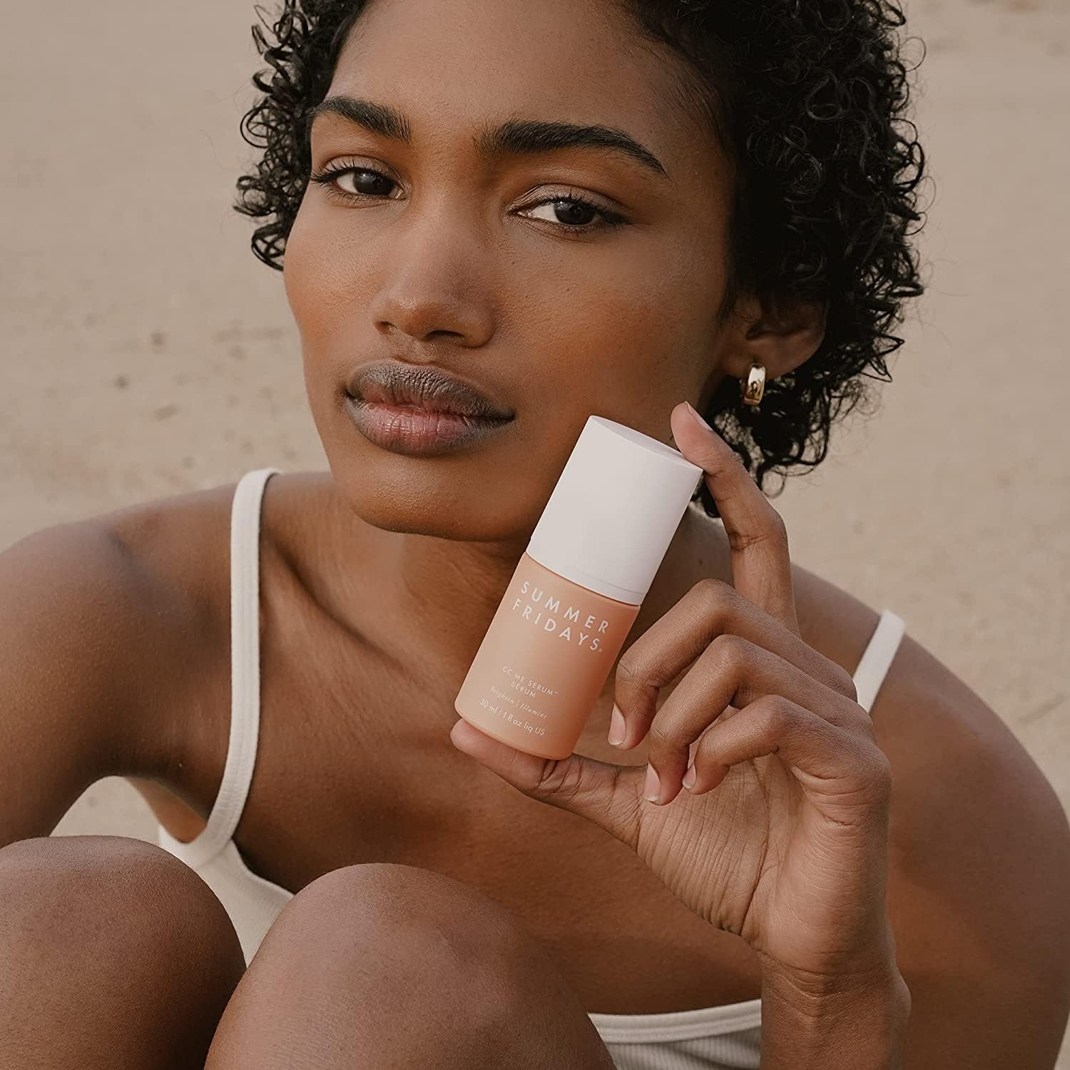Summer Fridays CC Me Serum packaging bottle on countertop
