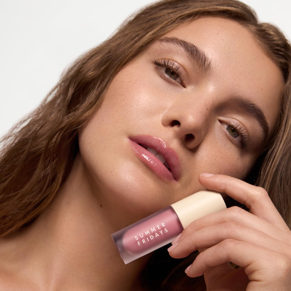 Application on lips reveals smooth glide and rose tint.