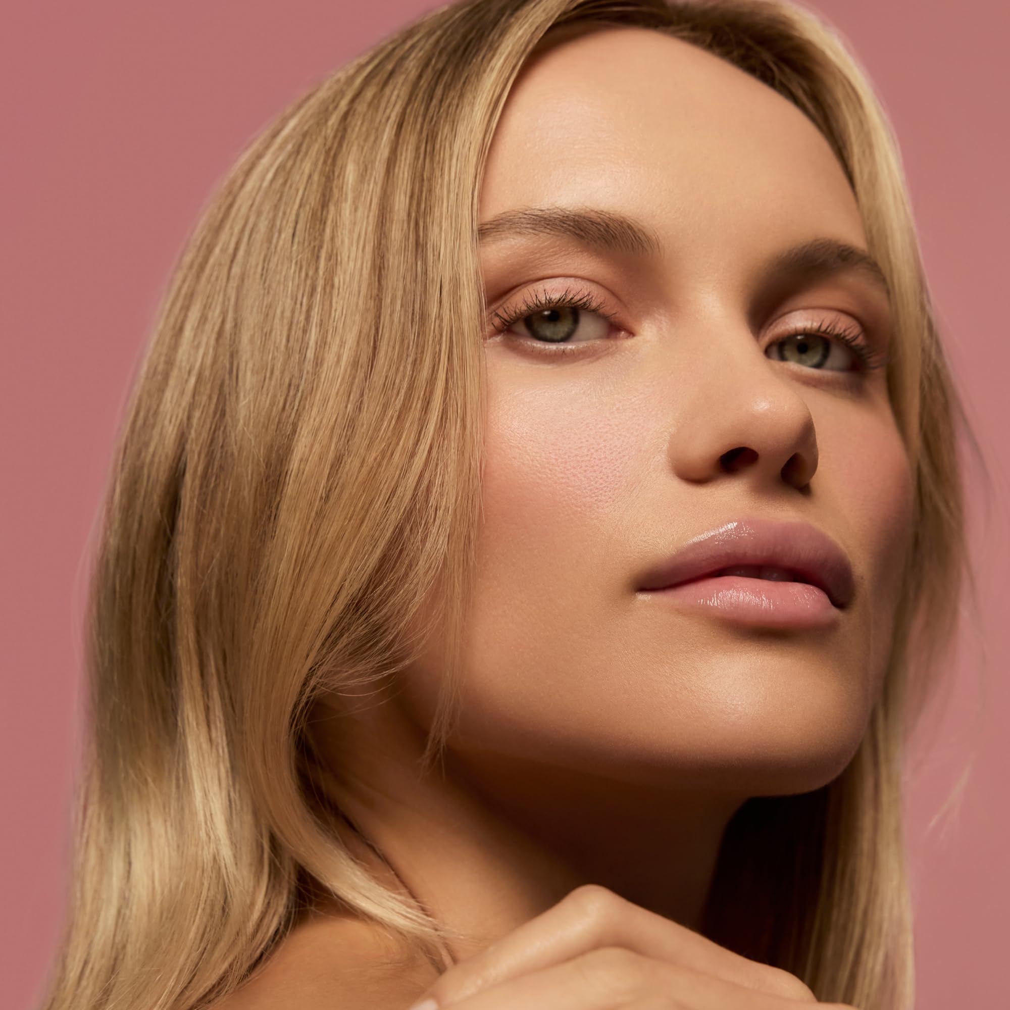 Summer Fridays Dream Lip Oil travel-size compact supports on-the-go hydration.