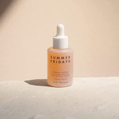 Summer Fridays Heavenly Sixteen dropper releasing silky oil for quick moisture.