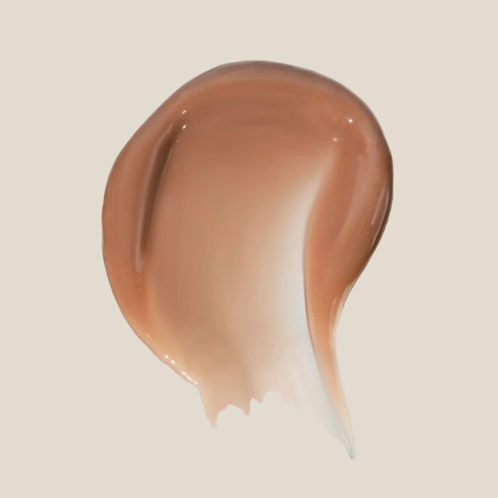 Summer Fridays Iced Coffee tinted lip balm application closeup for instant hydration.