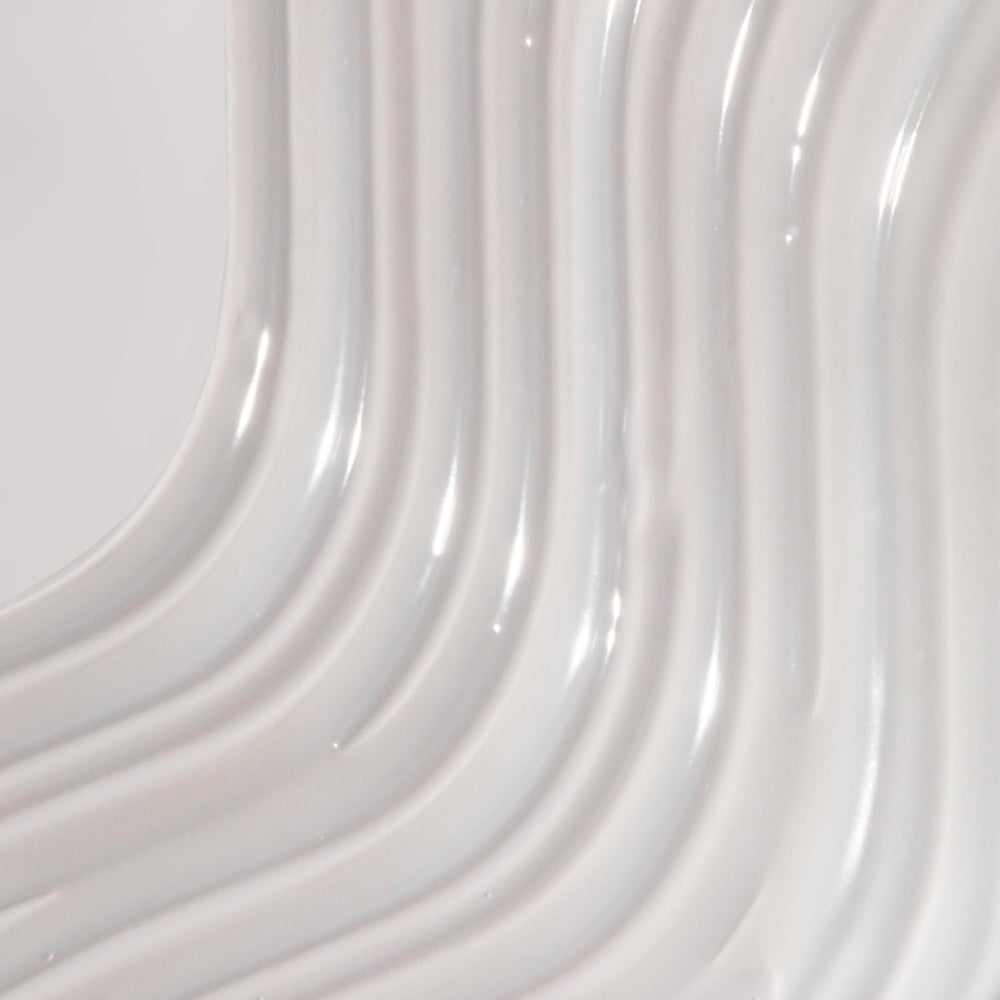 Close-up of the Serum dropper delivering a precise eye-area dose