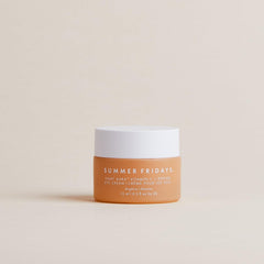 Applying Light Aura Eye Cream for hydration around the eyes.