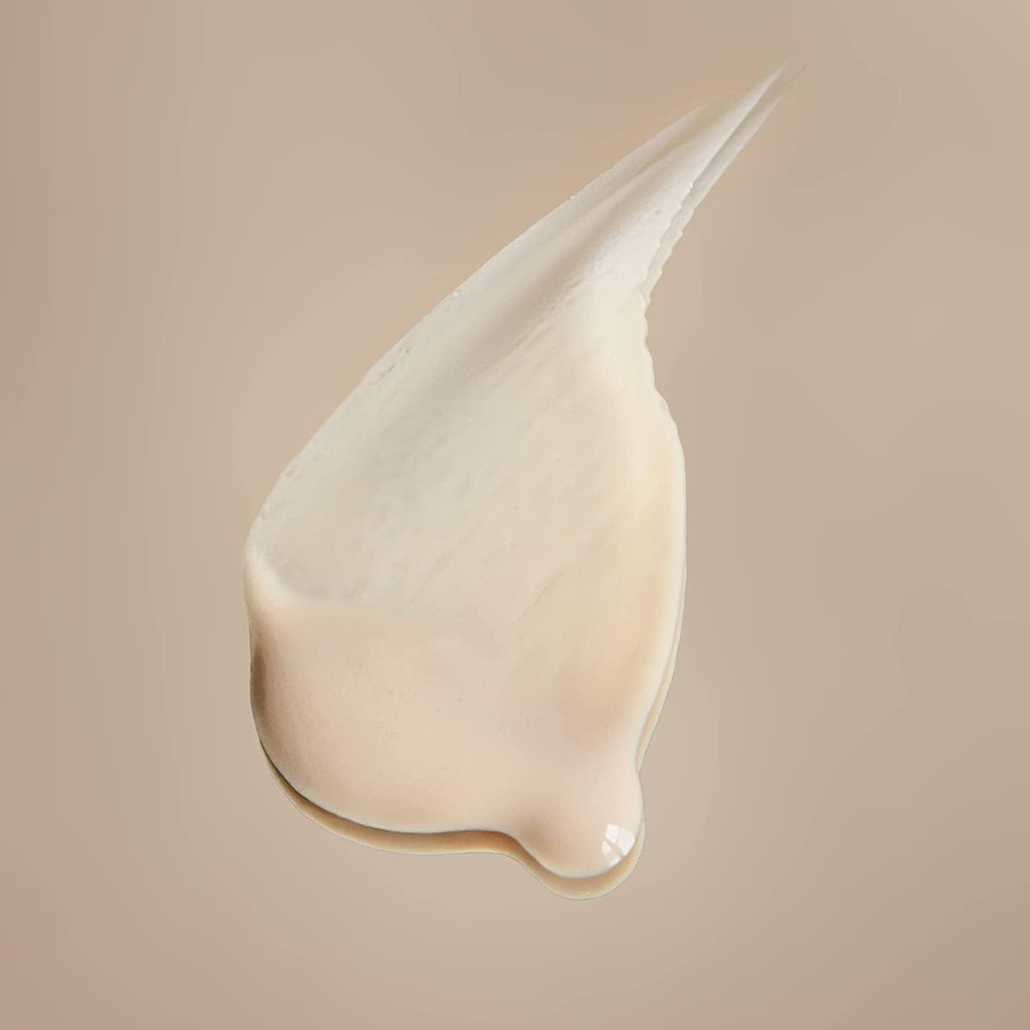 Summer Fridays ShadeDrops SPF 30 serum-like swatch shows mineral finish.