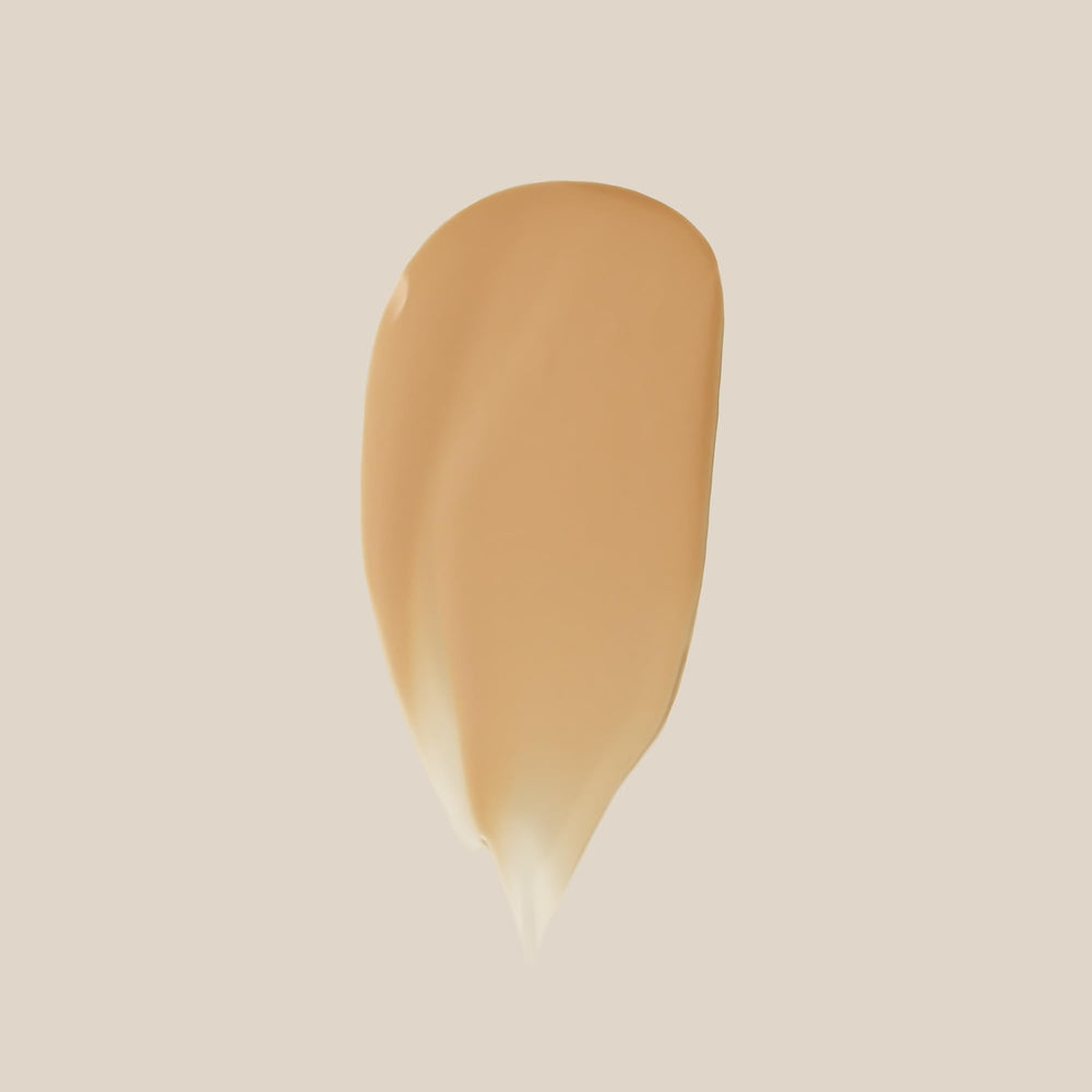 Summer Fridays Sheer Skin Tint dispenser close-up highlights easy, smooth application.