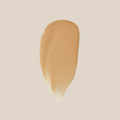 Summer Fridays Sheer Skin Tint dispenser close-up highlights easy, smooth application.