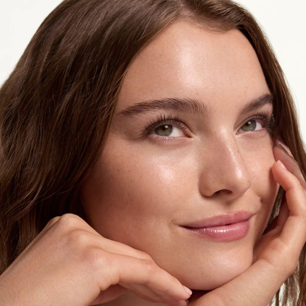 Summer Fridays Sheer Skin Tint on-skin portrait reveals natural finish.