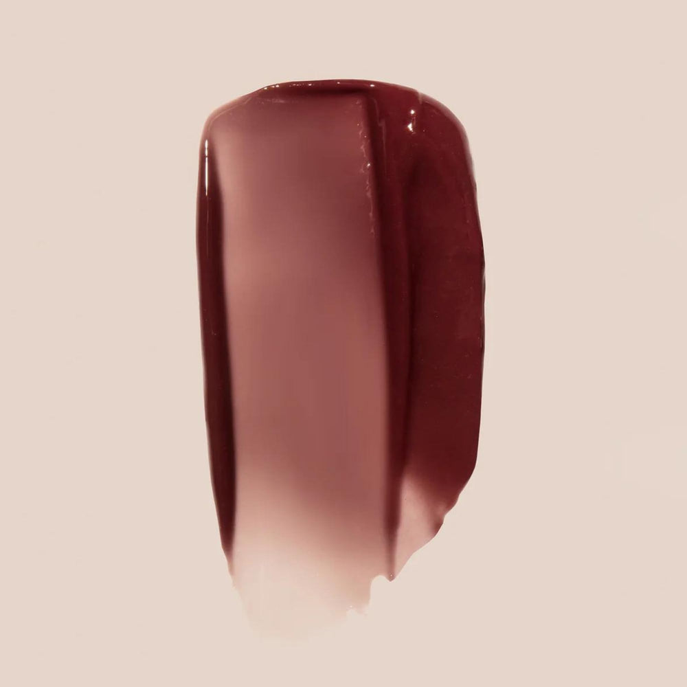 Swatched shade shows sheer rosy-brown tint and glow from Summer Fridays lip butter.