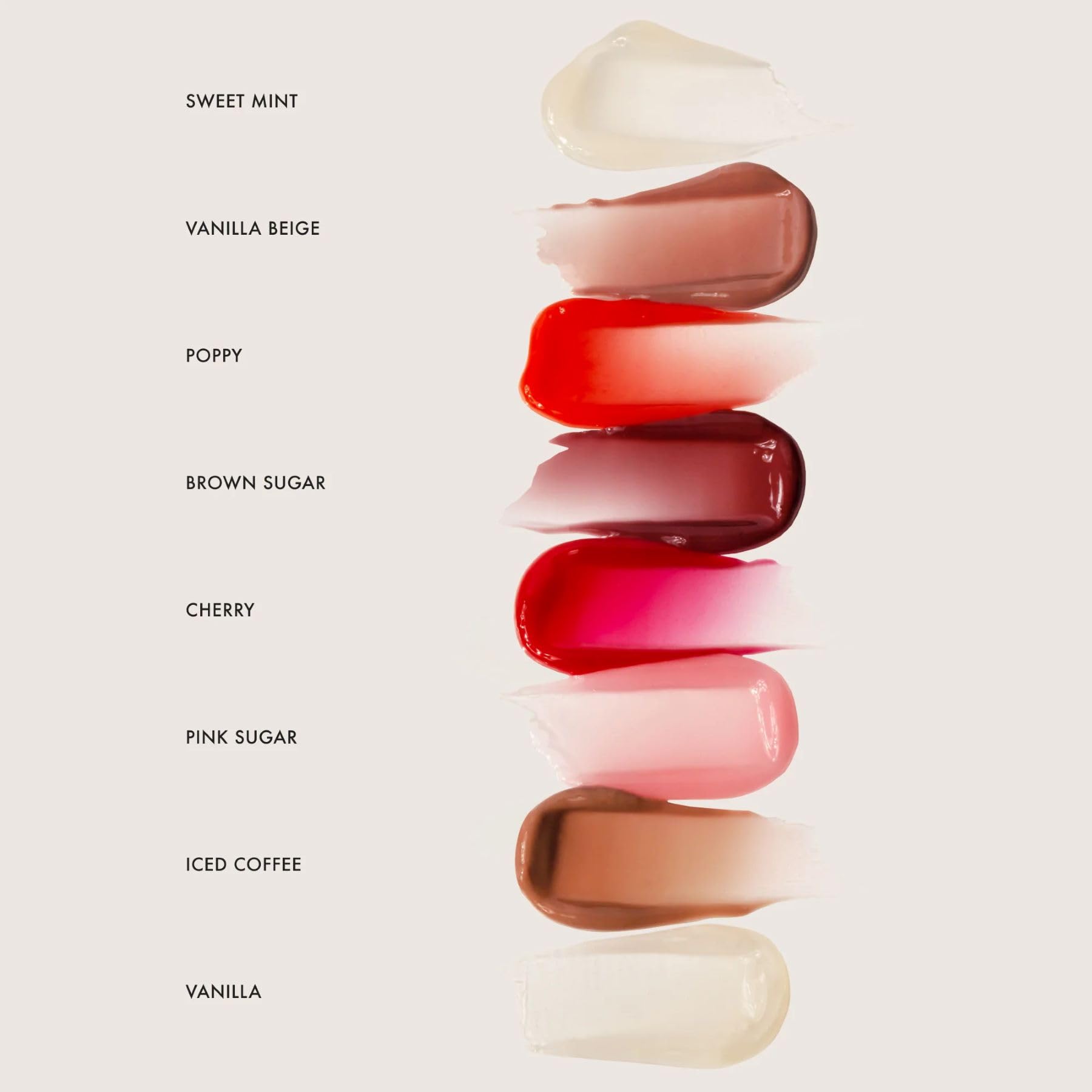Summer Fridays Pink Sugar on lips yields sheer pink glow.