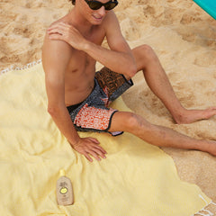 Sun Bum SPF 70 lotion applied on skin for daytime sun protection.