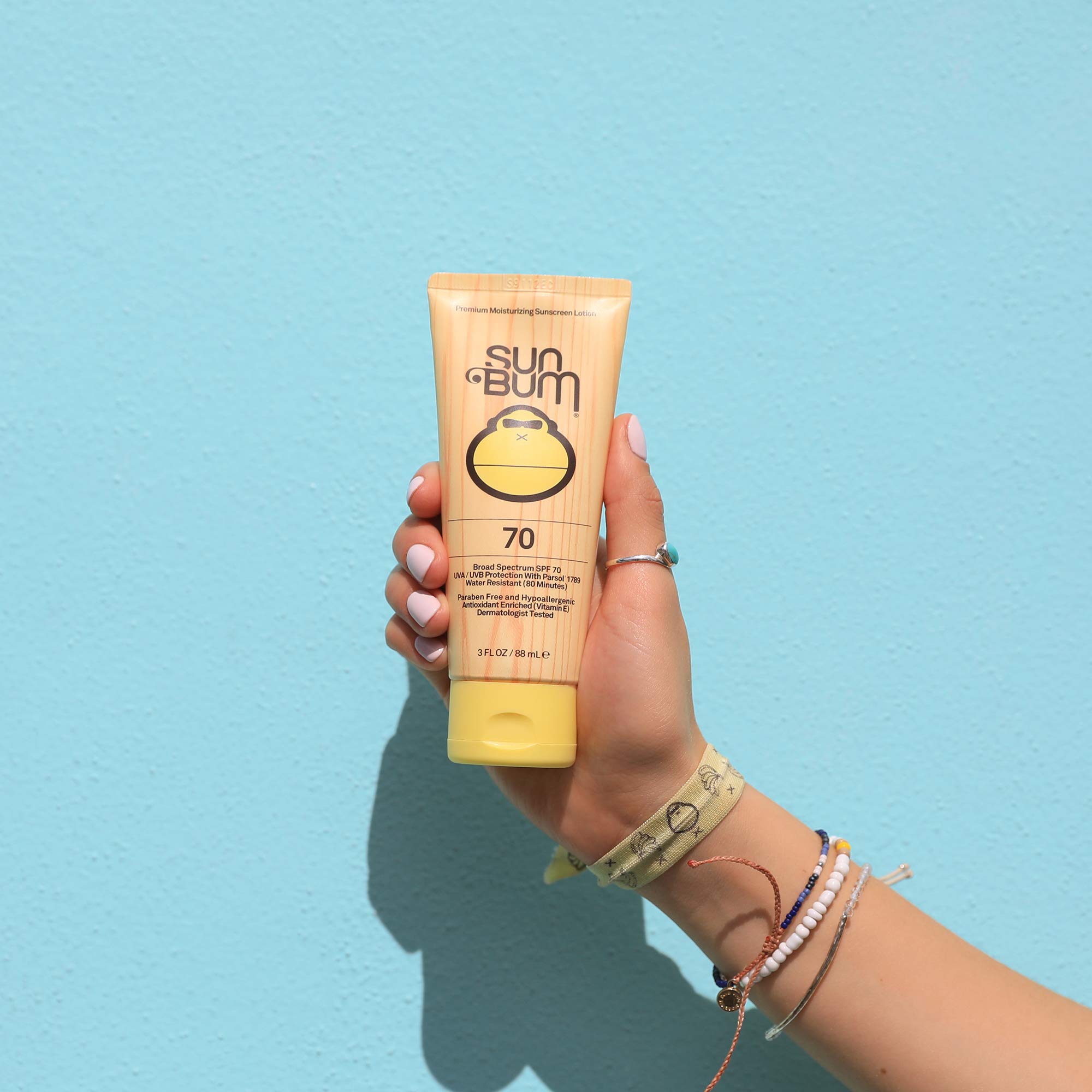 Sun Bum Original SPF 70 lotion being spread on skin for even coverage
