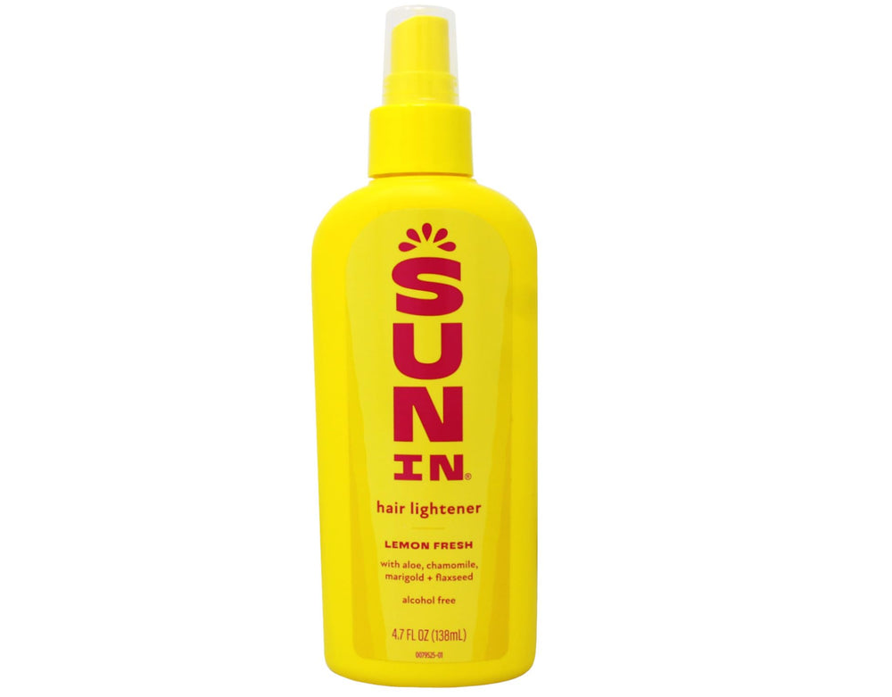 Sun-In Hair Lightener Spray Lemon Fresh mist applied outdoors for natural brightness.