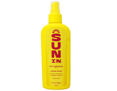 Sun-In Hair Lightener Spray Lemon Fresh mist applied outdoors for natural brightness.