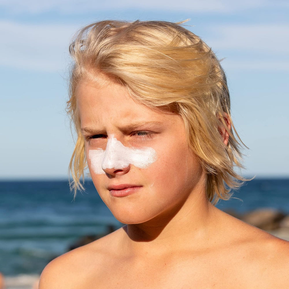 Sun Zapper sunscreen stick in action during activity suggesting lasting outdoor protection