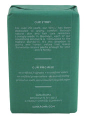 Sunaroma soap bar close-up displaying creamy lather and natural composition in shower setting