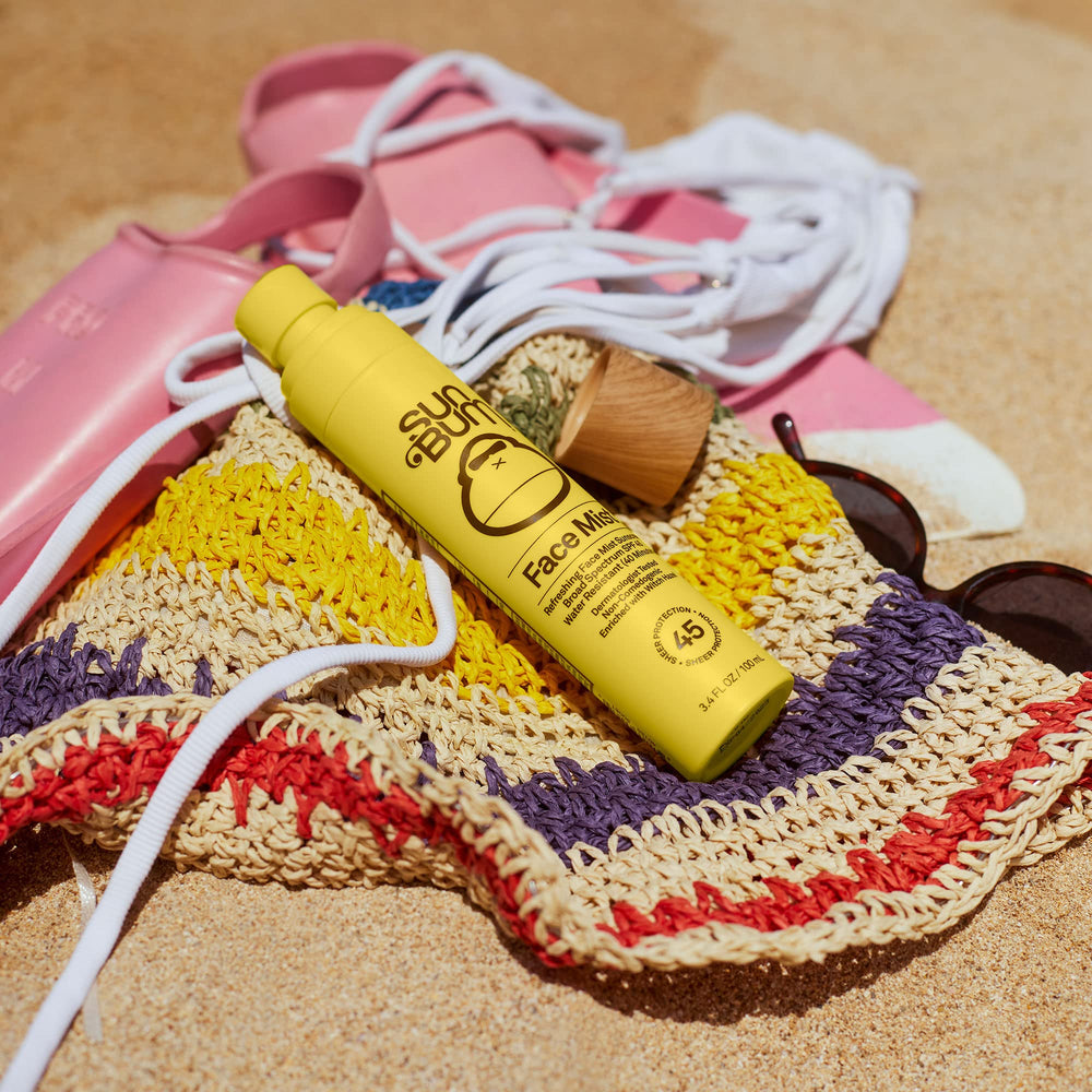 Vitamin E enriched Sun Bum formula shown in product imagery.