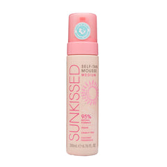 Sunkissed Self Tan Mousse Medium bottle pour for fast, natural bronze glow.
