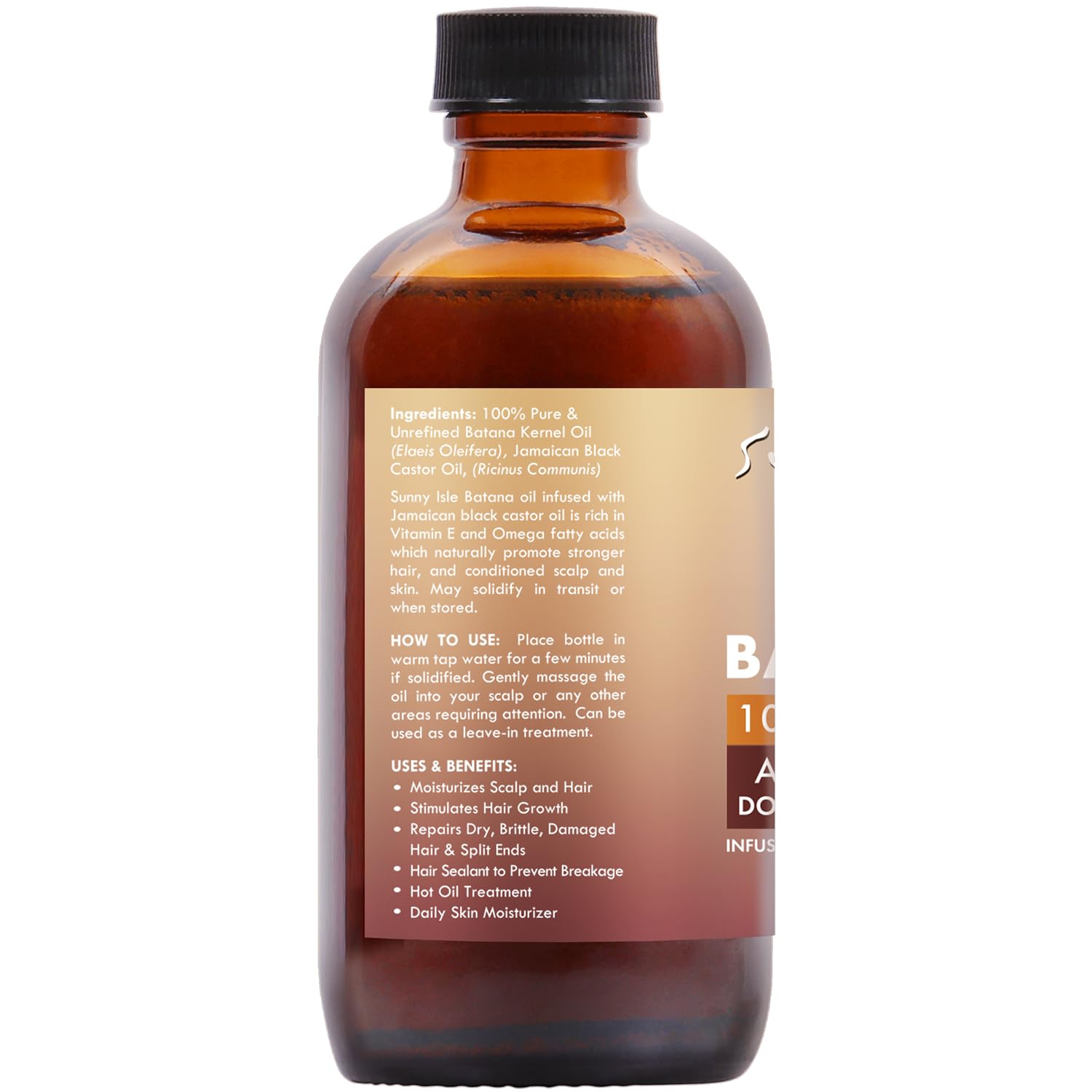 Sunny Isle Batana Oil bottle on wooden background.