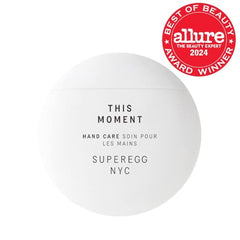 SUPEREGG This Moment Hand Care cream texture close-up shows rich hydration