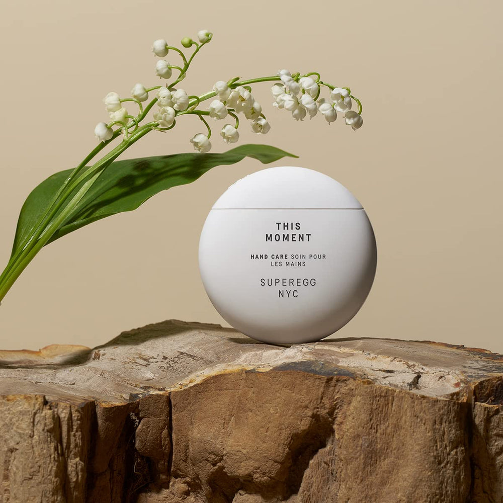 SUPEREGG This Moment Hand Care hands applying cream for quick absorption and non-greasy finish