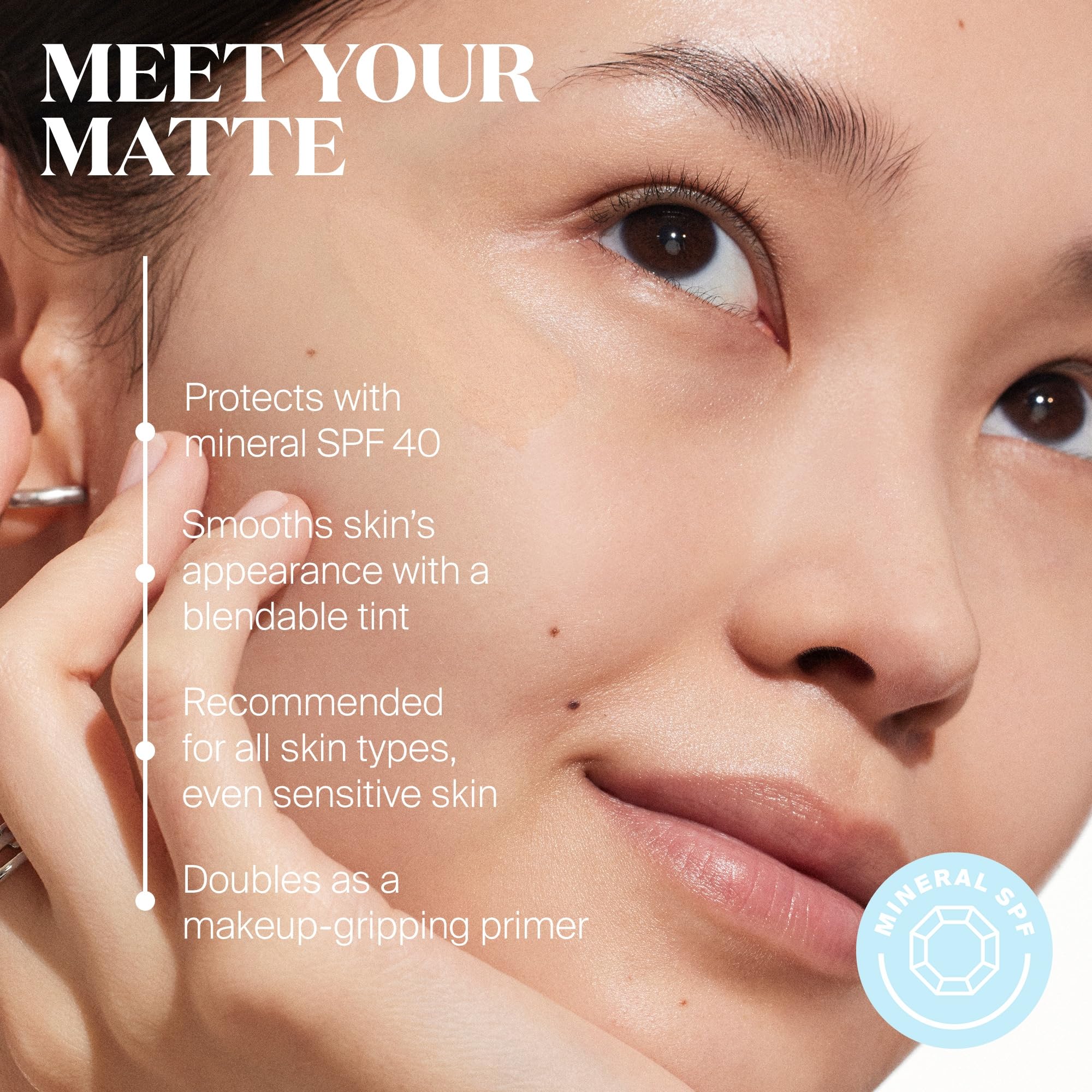 Hand applying Supergoop! Mineral Mattescreen for daily oil-free protection