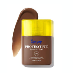 Supergoop Protec(tint) bottle closeup shows lightweight formula for even skin.