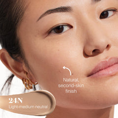 Supergoop Protec(tint) SPF 50 texture being blended with fingers.