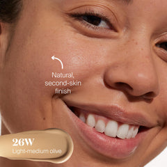 Applying Protec(tint) on the face for a lightweight, blendable look