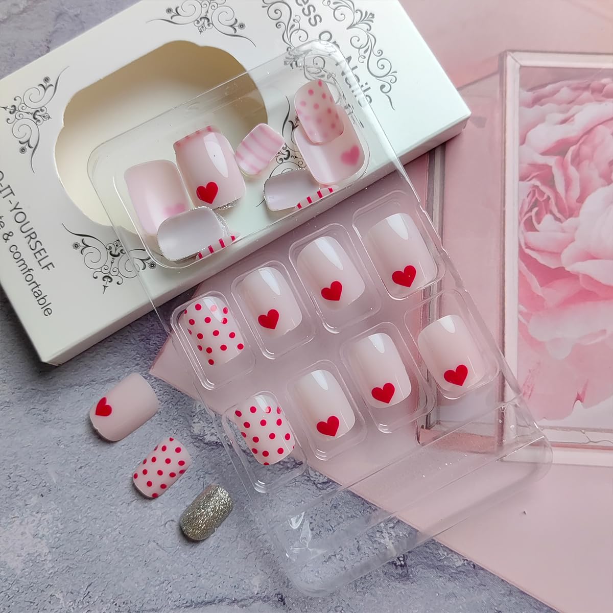 Sutaozhi Valentines nails displaying red heart detail for festive looks