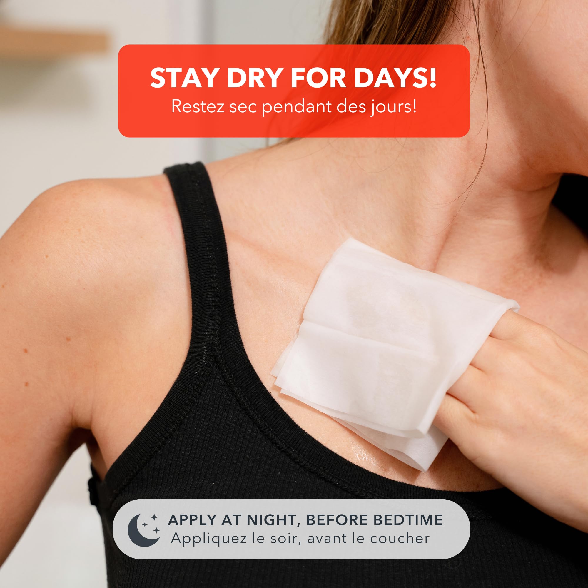 Hands treated with SweatBlock wipe for moisture control during activities.