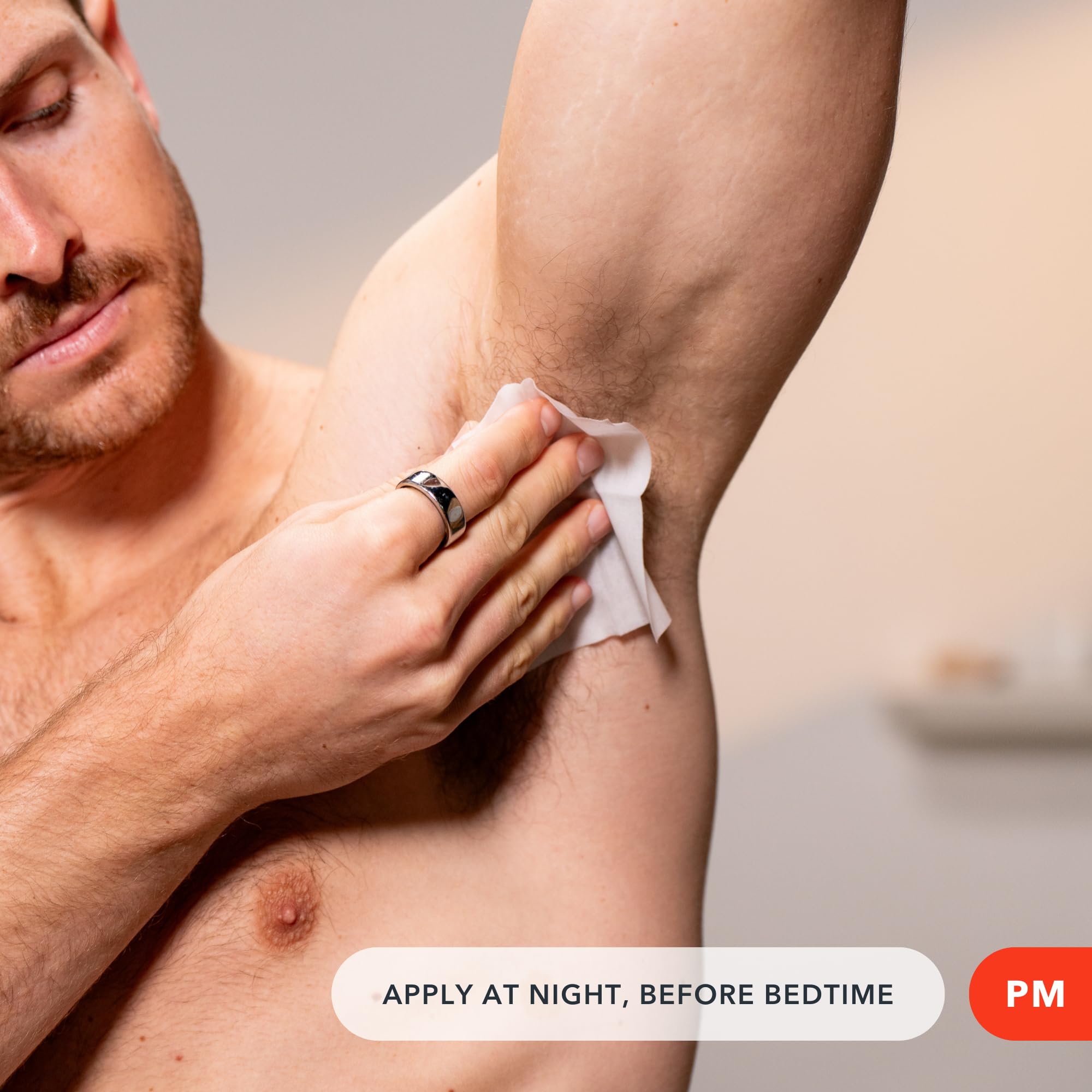 Nighttime application scene with SweatBlock wipes for long-lasting protection.
