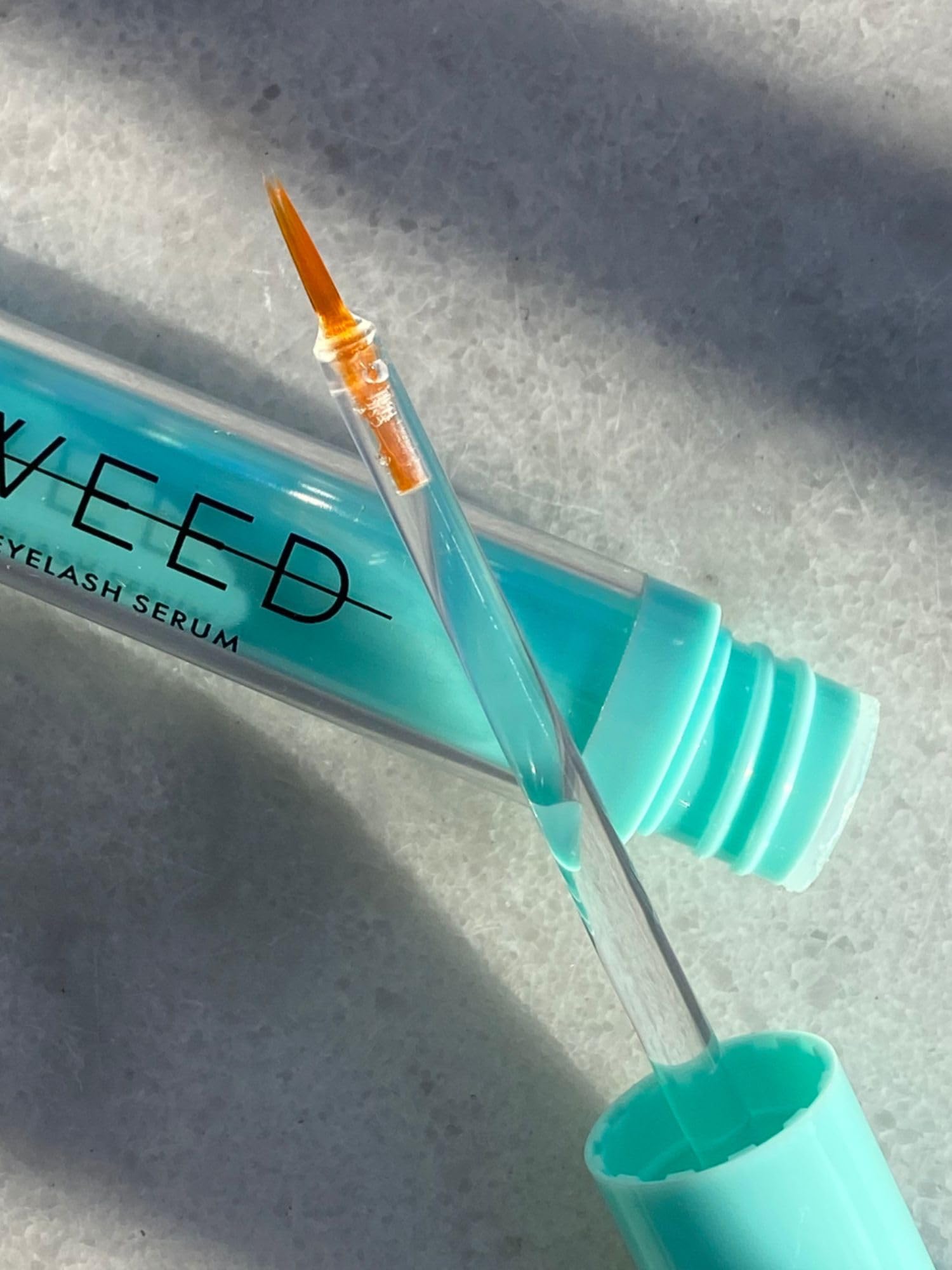 Compact 3 ml SWEED bottle ready for daily lash care on the go.