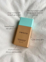SWEED Glass Skin Foundation applied with brush for smooth blend.