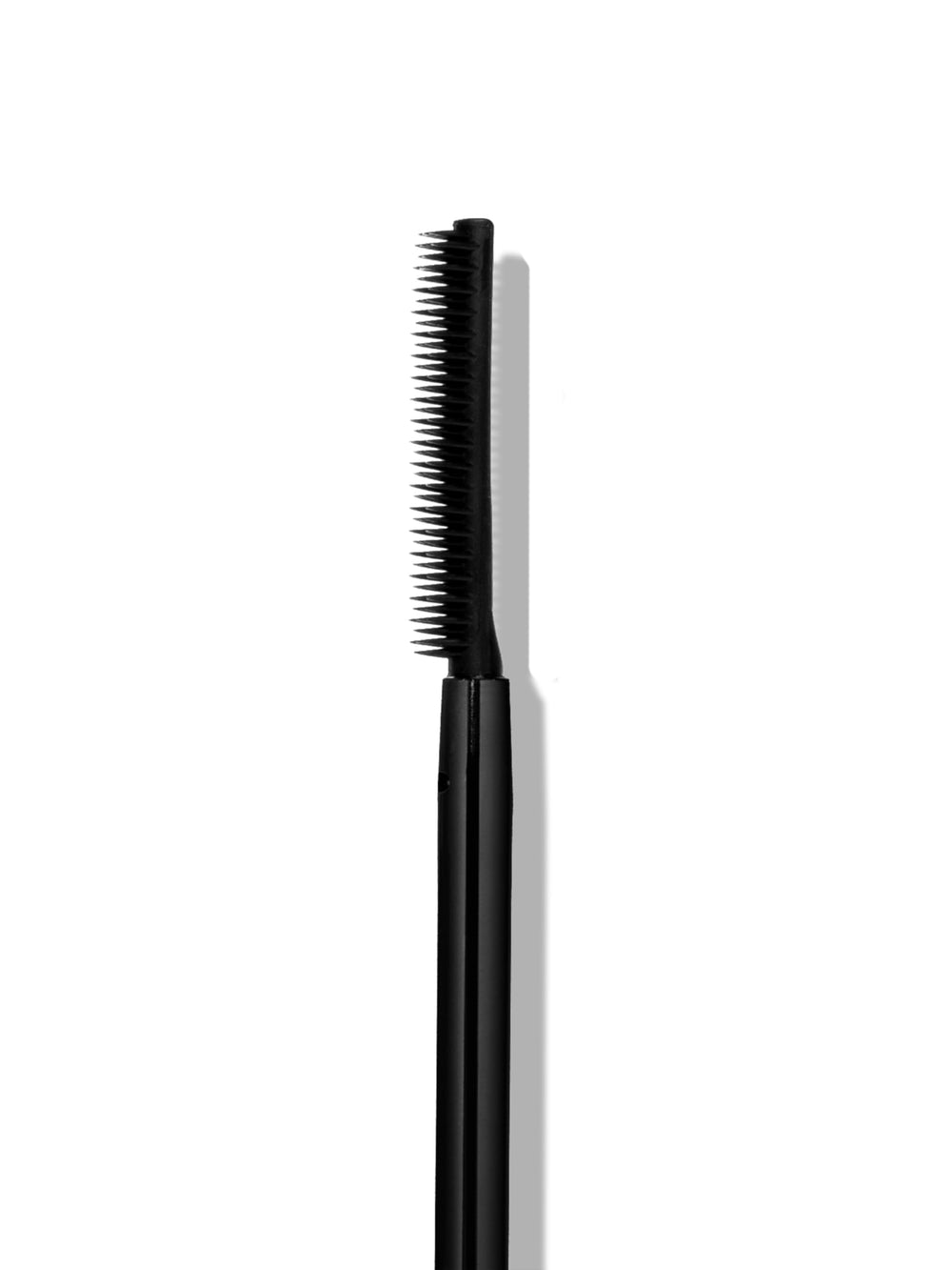Sweed Lash Lift Mascara wand angled to reveal buildable length and separation.