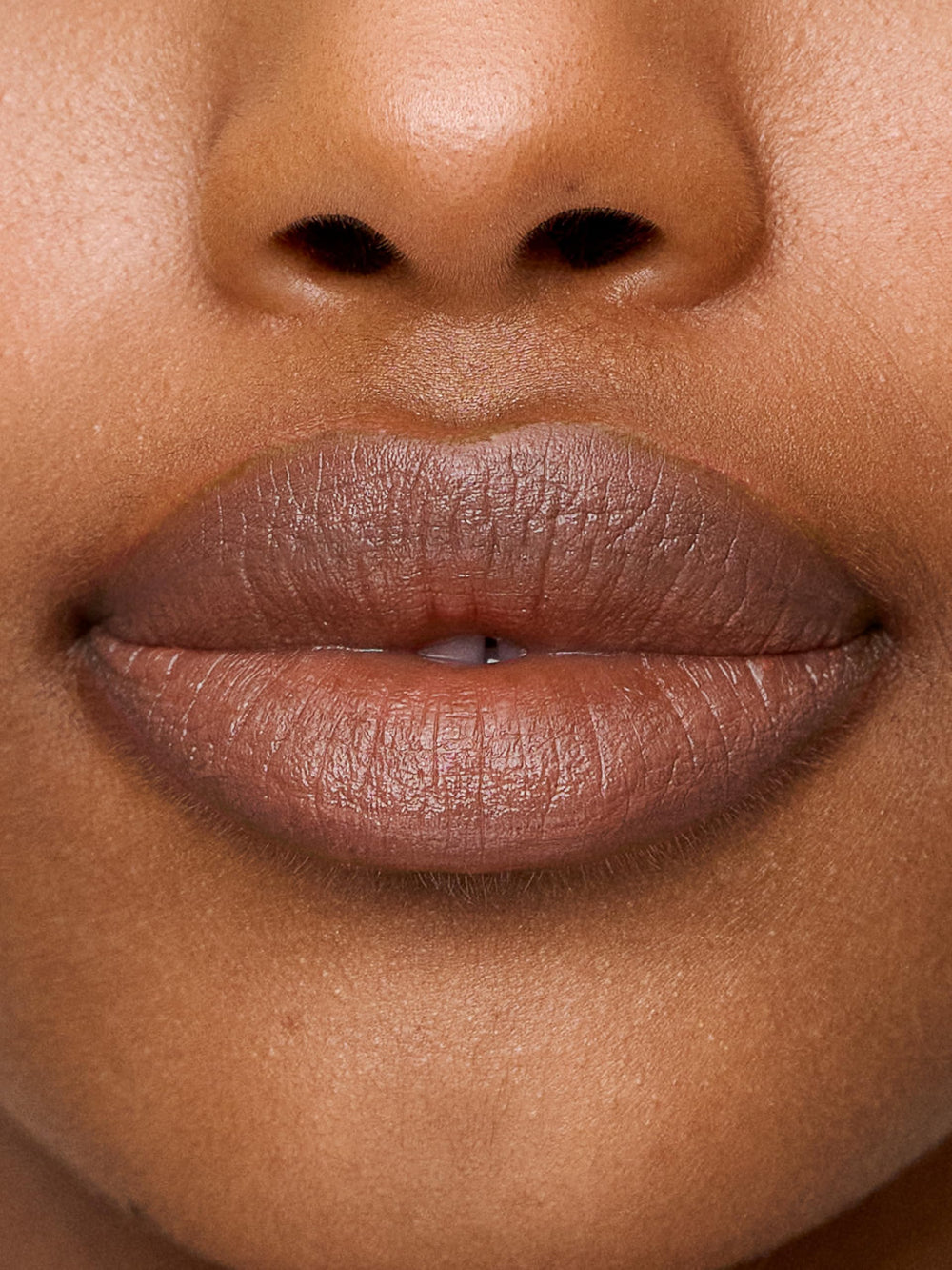 Sweed Le Lipstick close-up captures creamy, balmy texture and subtle shine.