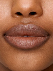 Sweed Le Lipstick close-up captures creamy, balmy texture and subtle shine.