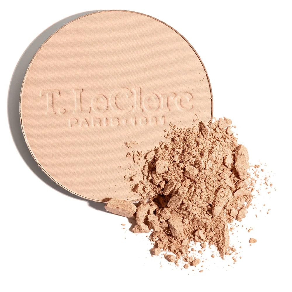 T. LeClerc Rice Compact Powder being applied for even coverage.