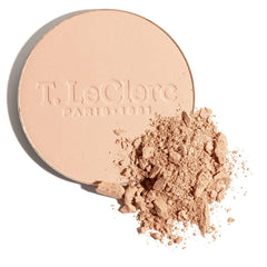 T. LeClerc Rice Compact Powder being applied for even coverage.