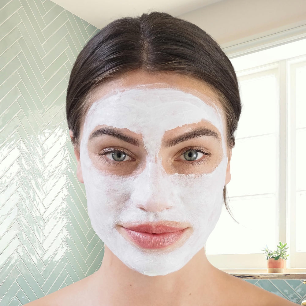 Mixing the mask with water or toner for a smooth paste.