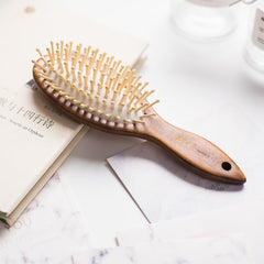 Tan Mujiang hair brush bristles closeup showing natural fibers