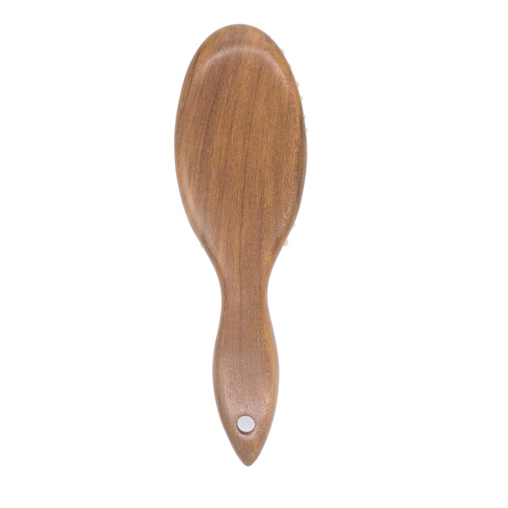 Tan Mujiang hair brush cushion system closeup for gentle brushing