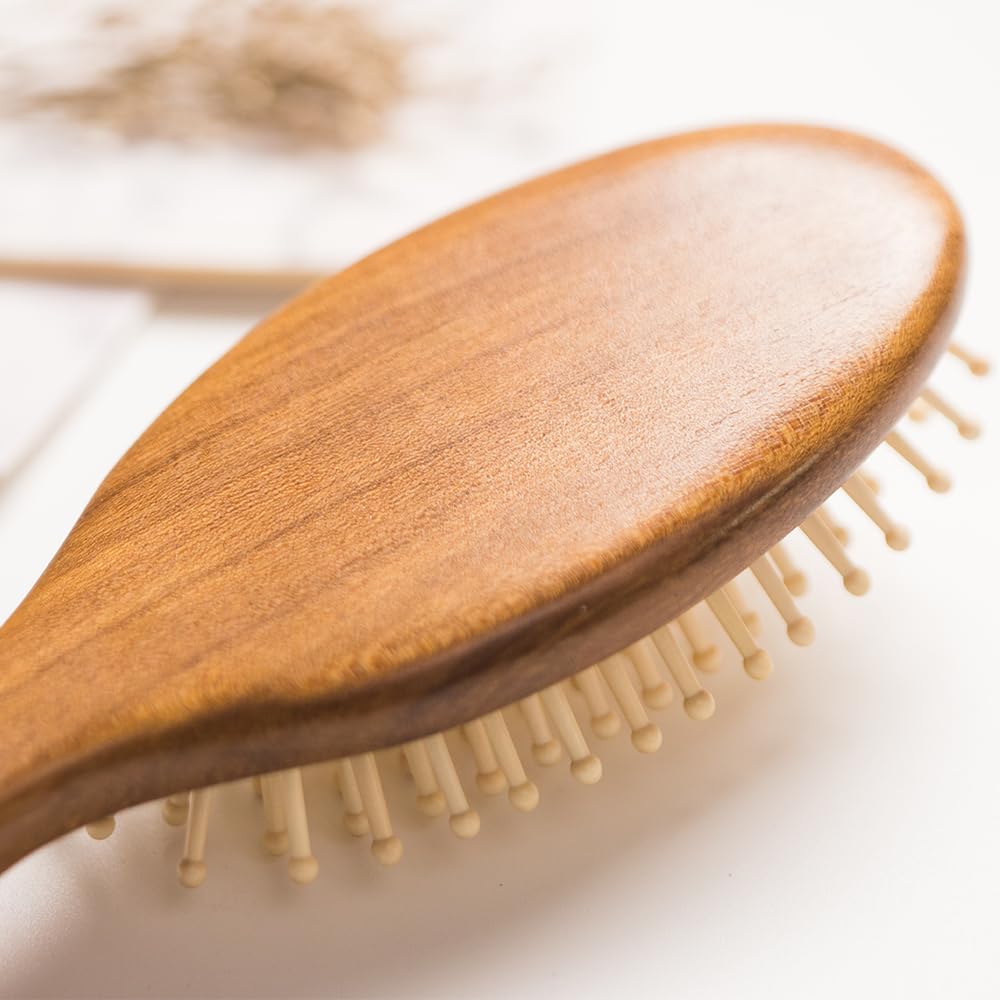 Tan Mujiang hair brush packaging highlighting sustainable craftsmanship