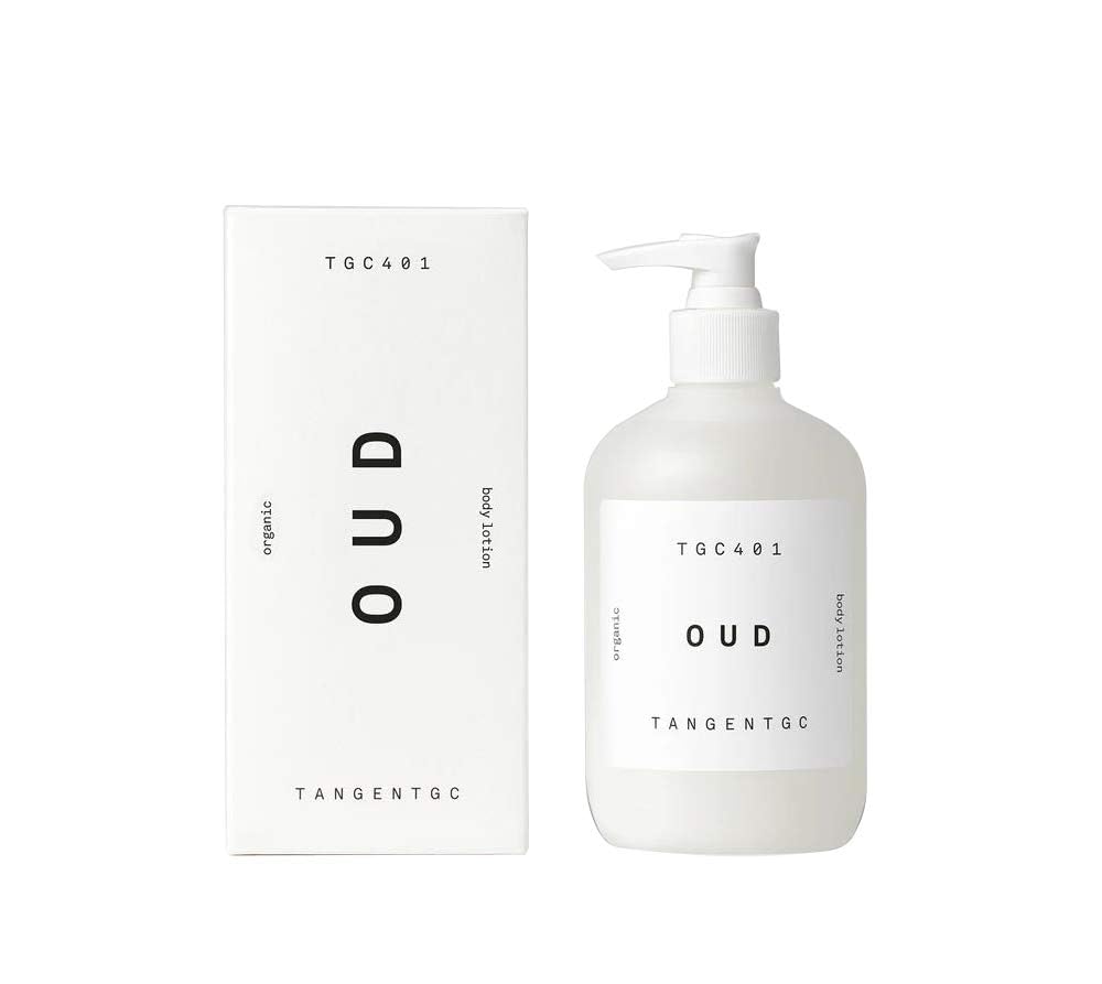 Tangent GC OUD Organic Body Lotion bottle close-up emphasizing hydrating texture and oud-citrus scent