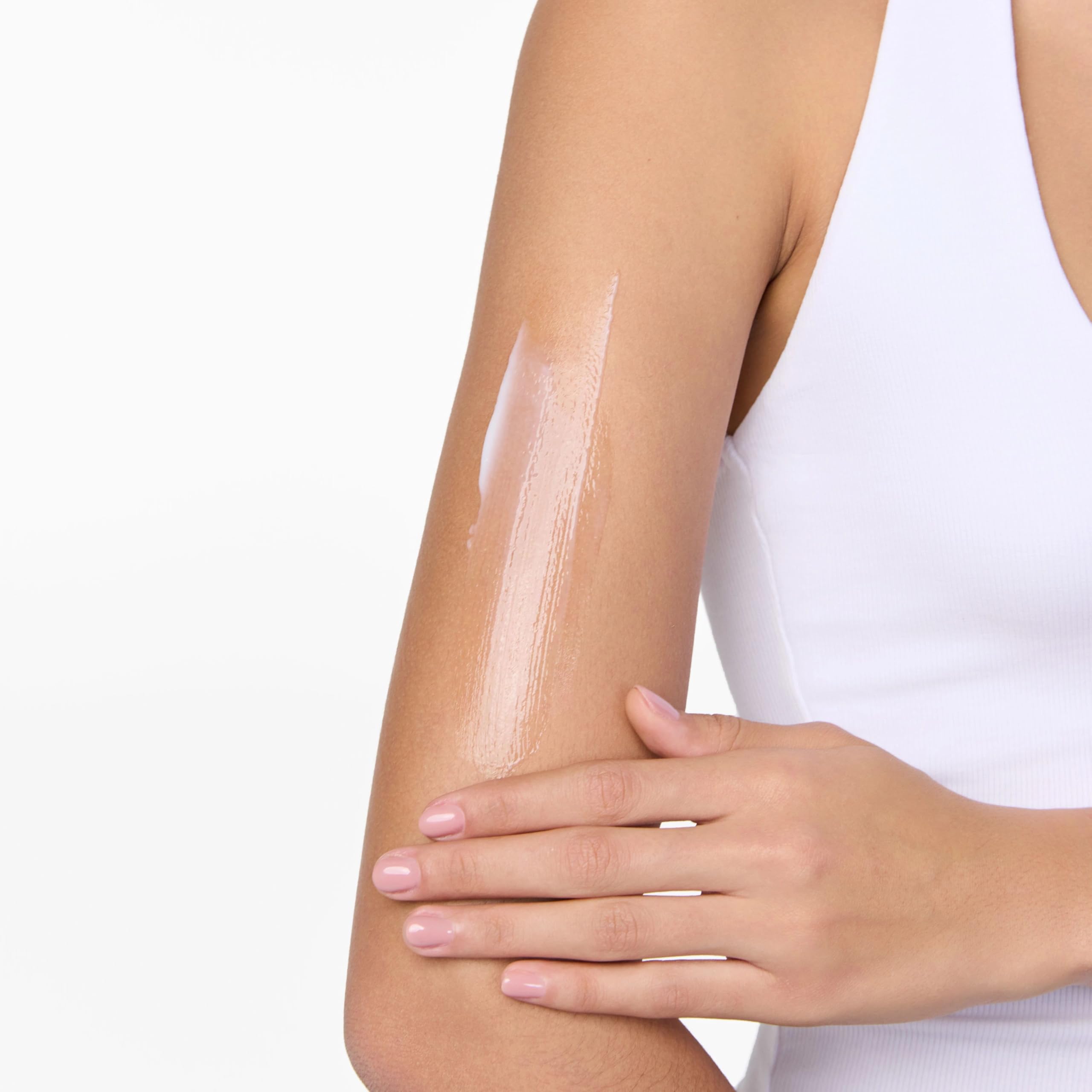 Daily use routine shot featuring Tanologist Brightening Daily Glow lotion