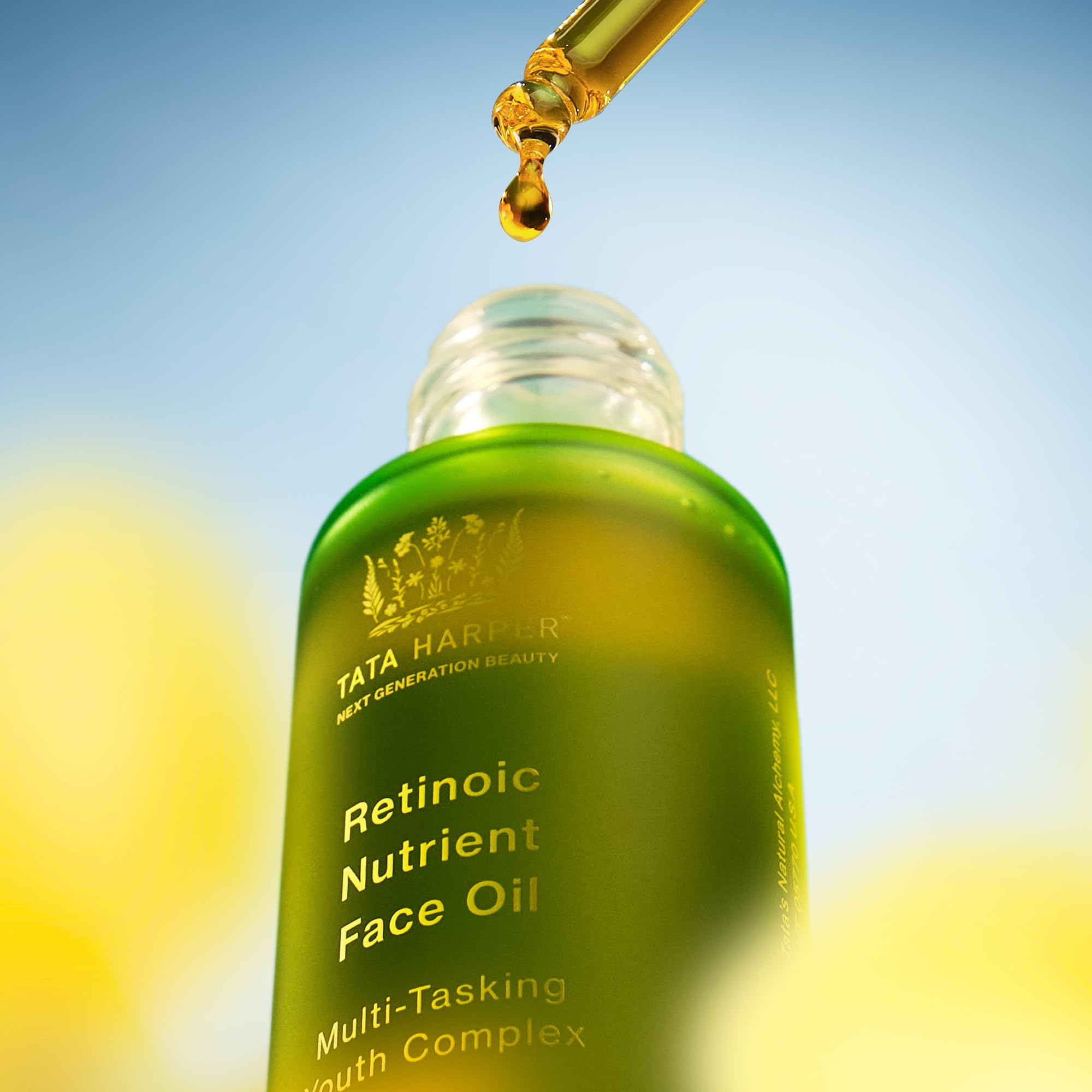 Tata Harper Retinoic Nutrient Face Oil packaging shown beside a clean vanity for premium skincare rituals