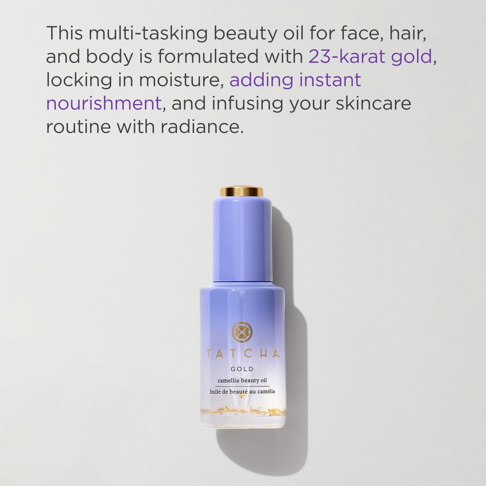 TATCHA Gold Camellia Beauty Oil on skin shows instant nourishment and a dewy finish.