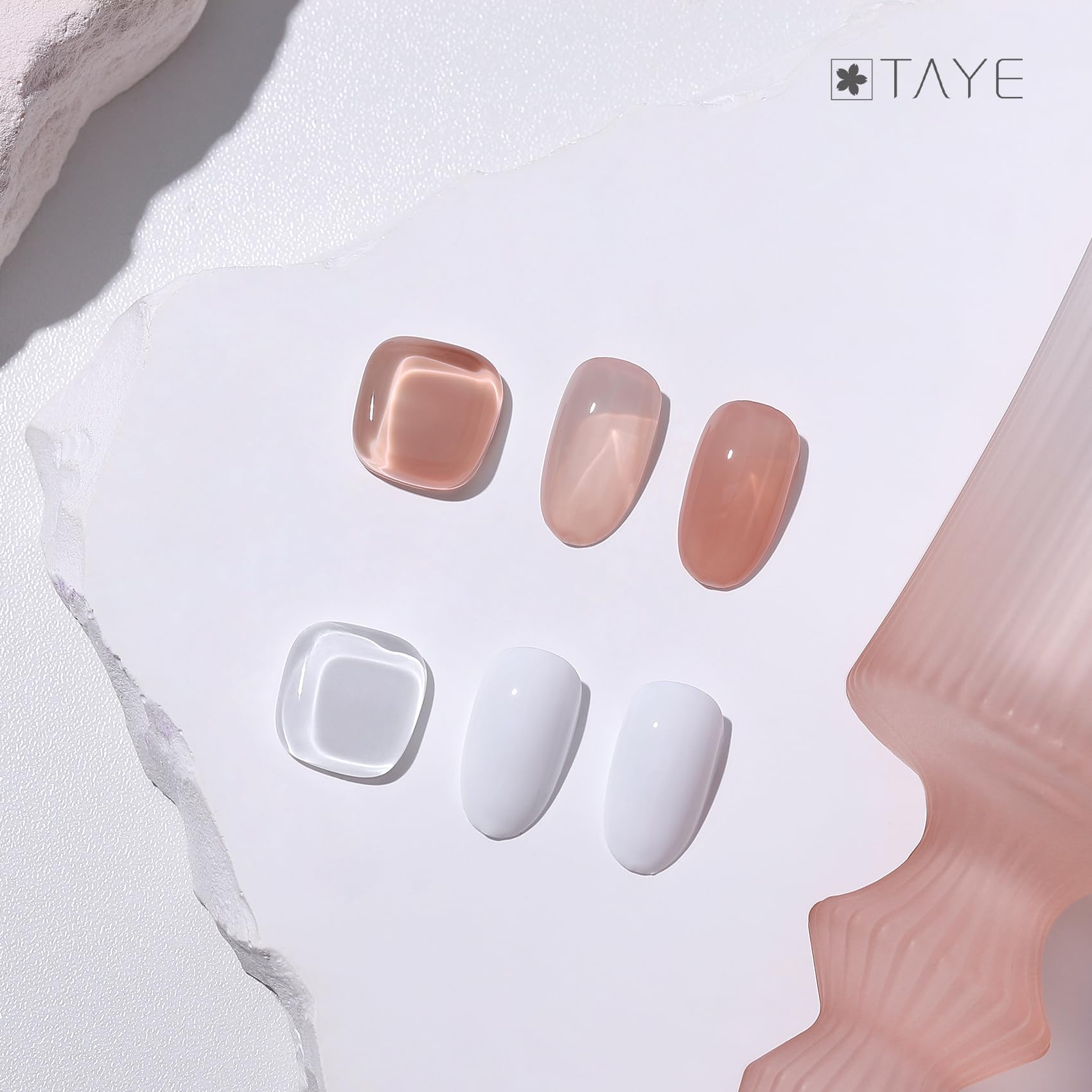 TAYE White French tip line closeup for crisp nail accents.