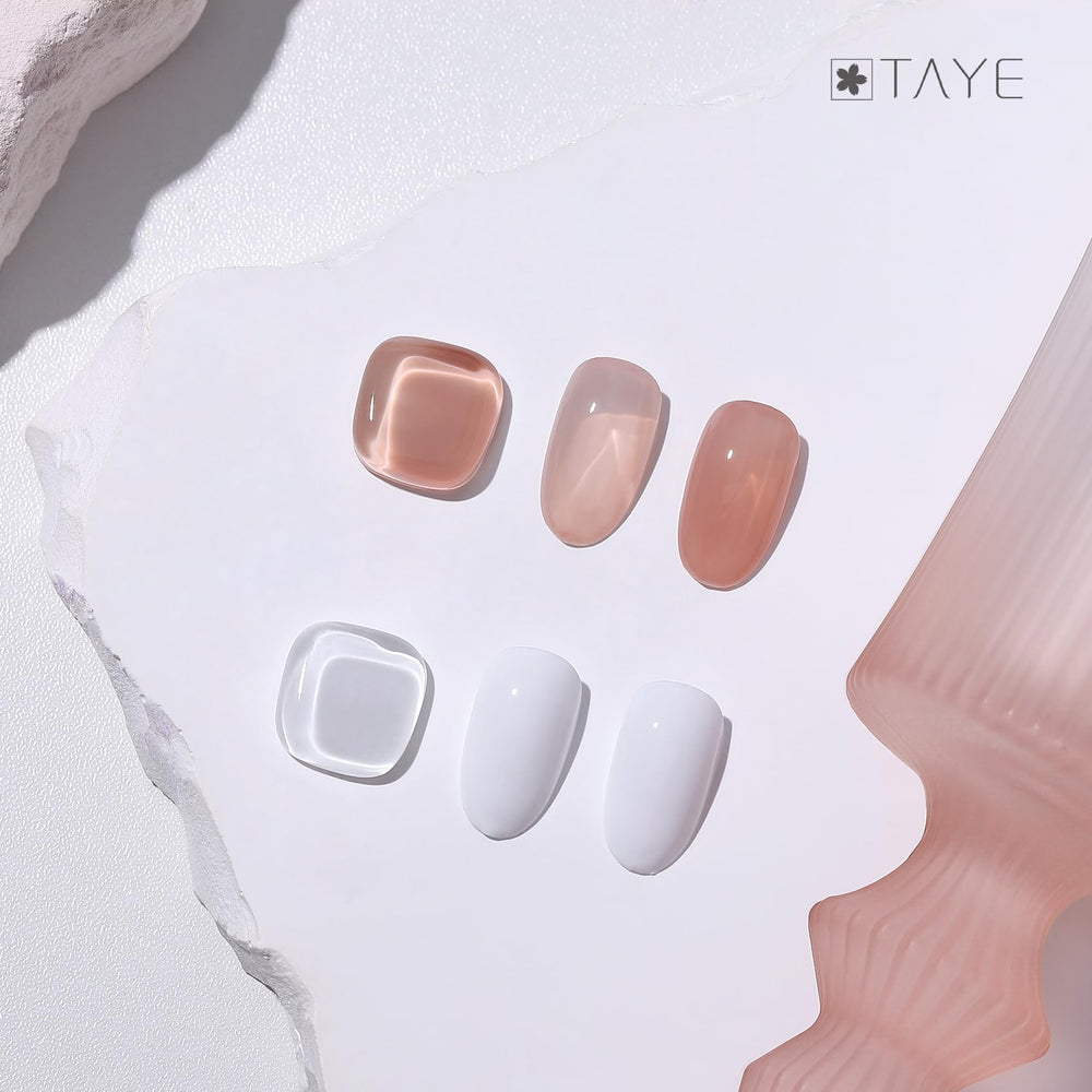 TAYE White French tip line closeup for crisp nail accents.